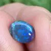 Solid black opal 0.6 ct