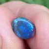Solid black opal 0.6 ct