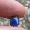 Solid black opal 0.6 ct