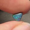 Black triangle solid opal 0.4 ct